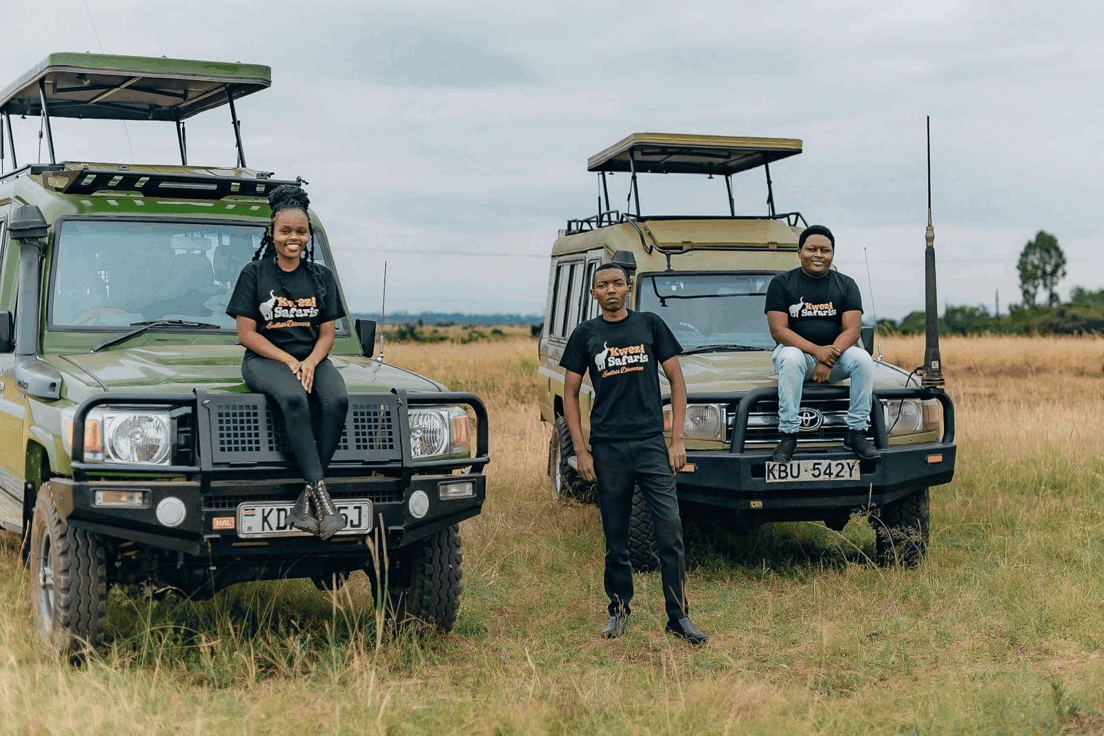 Kwezi Safaris Vehicles and kwezi team.