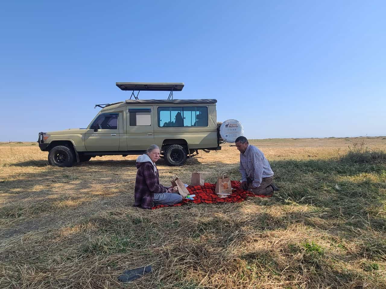 Guest enjoying a picnic lunch while on Kenya Big Five Safari