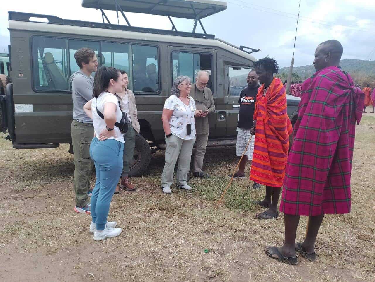 Kwezi Safaris guests meeting the Maasai on a Safari across Kenya
